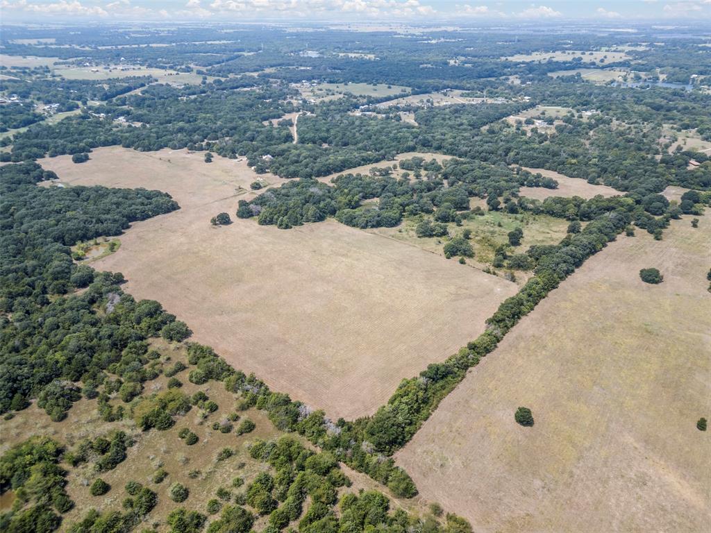 0 Cr-339 Terrell, TX 75161 - Photo 24 of 24 an aerial view of residential houses with outdoor space