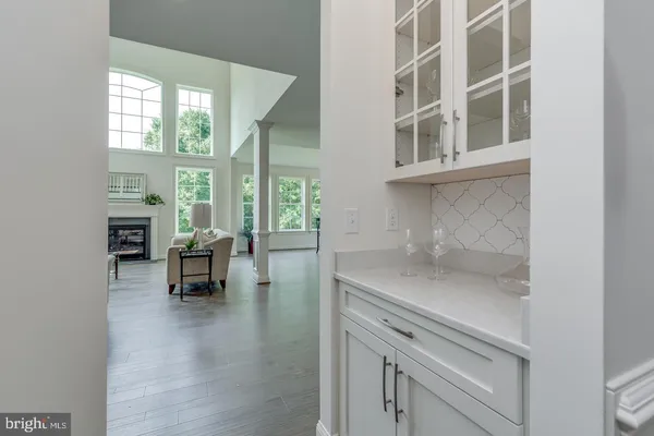 a view of a dining room with furniture and window