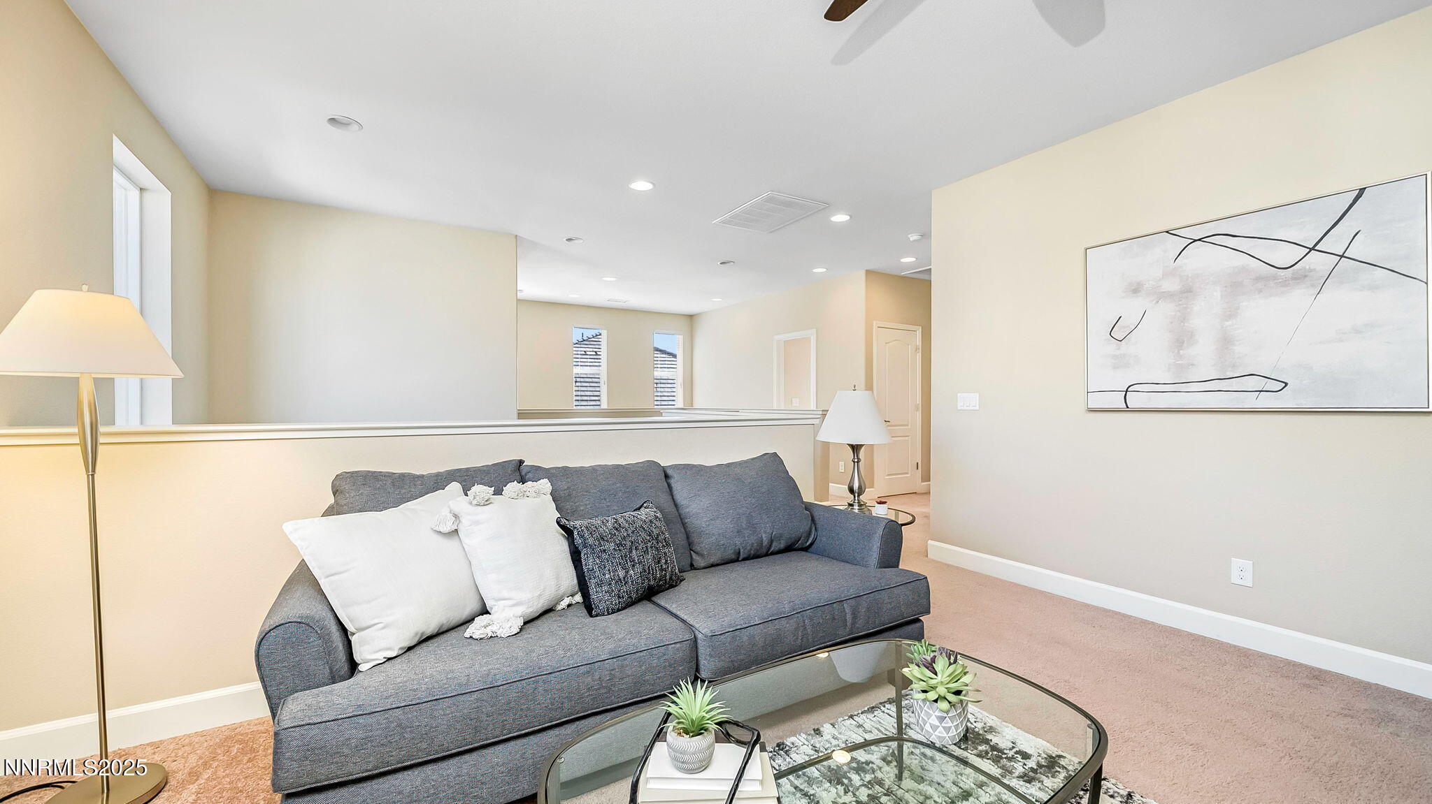 10115 Barrel Racer Drive Reno, NV 89521 - Photo 25 of 74 a living room with furniture and a couch