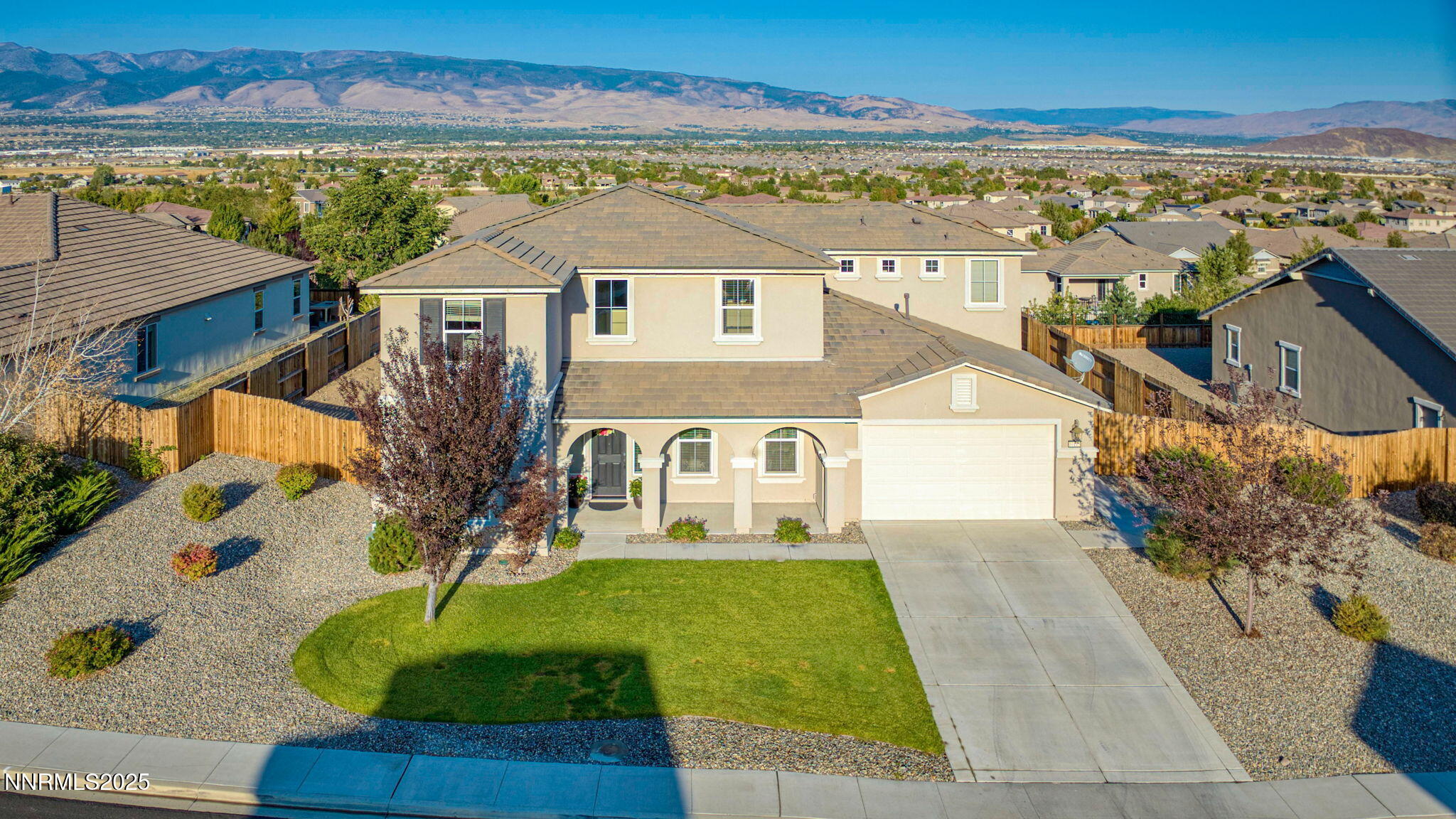 10115 Barrel Racer Drive Reno, NV 89521 - Photo 4 of 74 an aerial view of a house with a garden