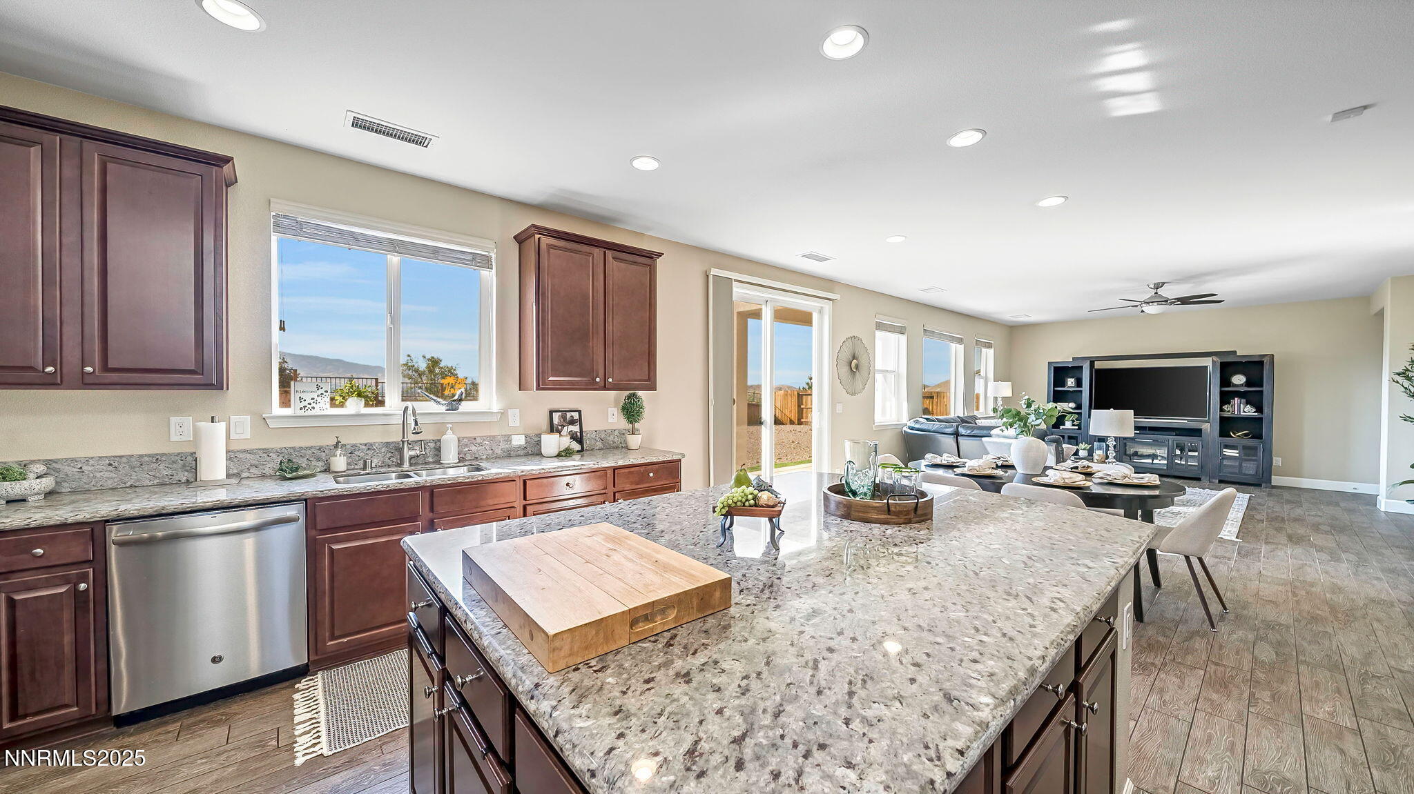 10115 Barrel Racer Drive Reno, NV 89521 - Photo 44 of 74 a kitchen with sink stove and cabinets