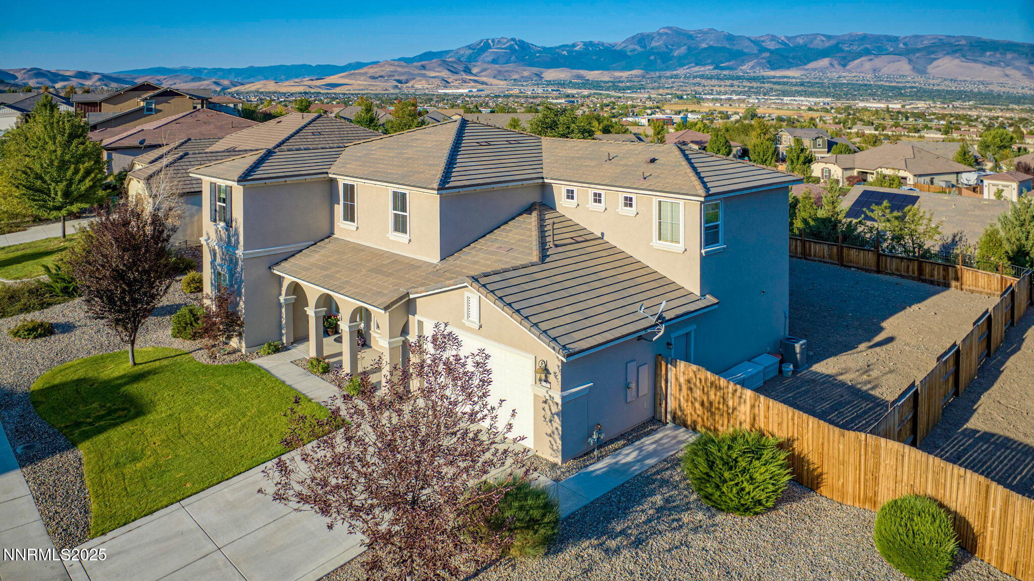 10115 Barrel Racer Drive Reno, NV 89521 - Photo 54 of 74 an aerial view of a house with a garden