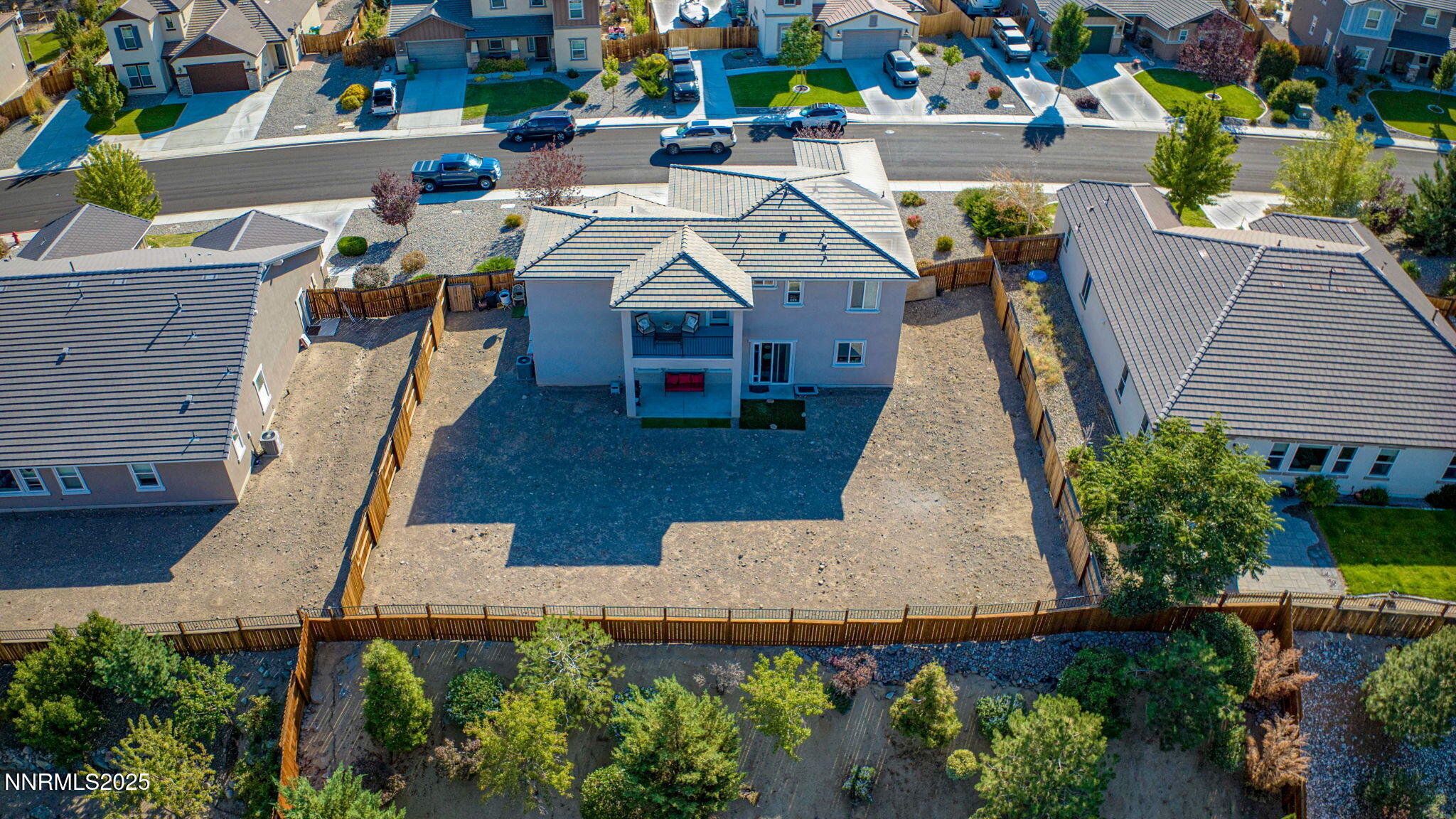 10115 Barrel Racer Drive Reno, NV 89521 - Photo 59 of 74 an aerial view of a house with swimming pool and plants