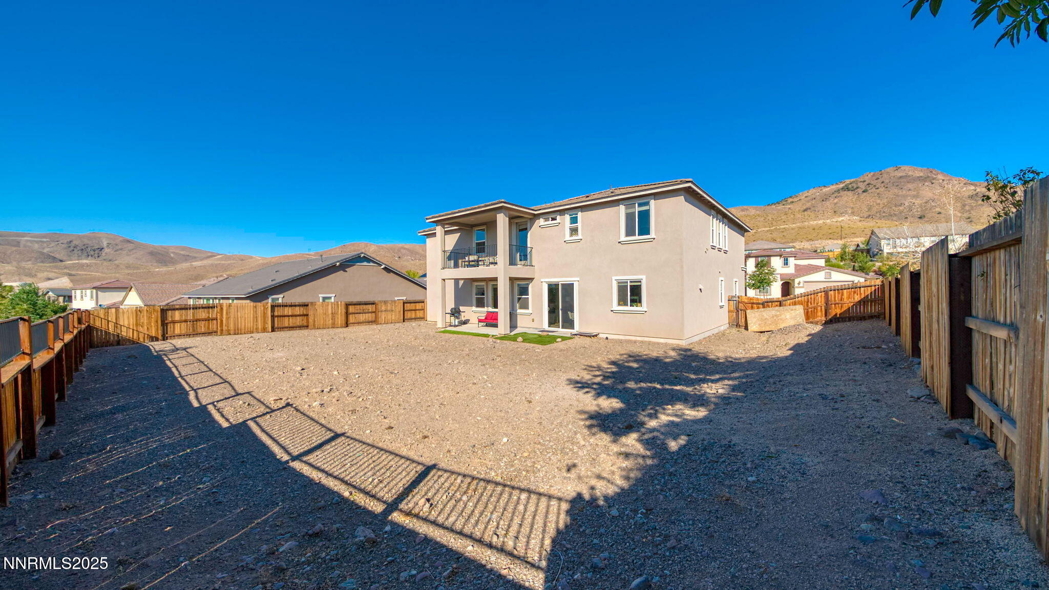 10115 Barrel Racer Drive Reno, NV 89521 - Photo 64 of 74 a front view of a house with a yard