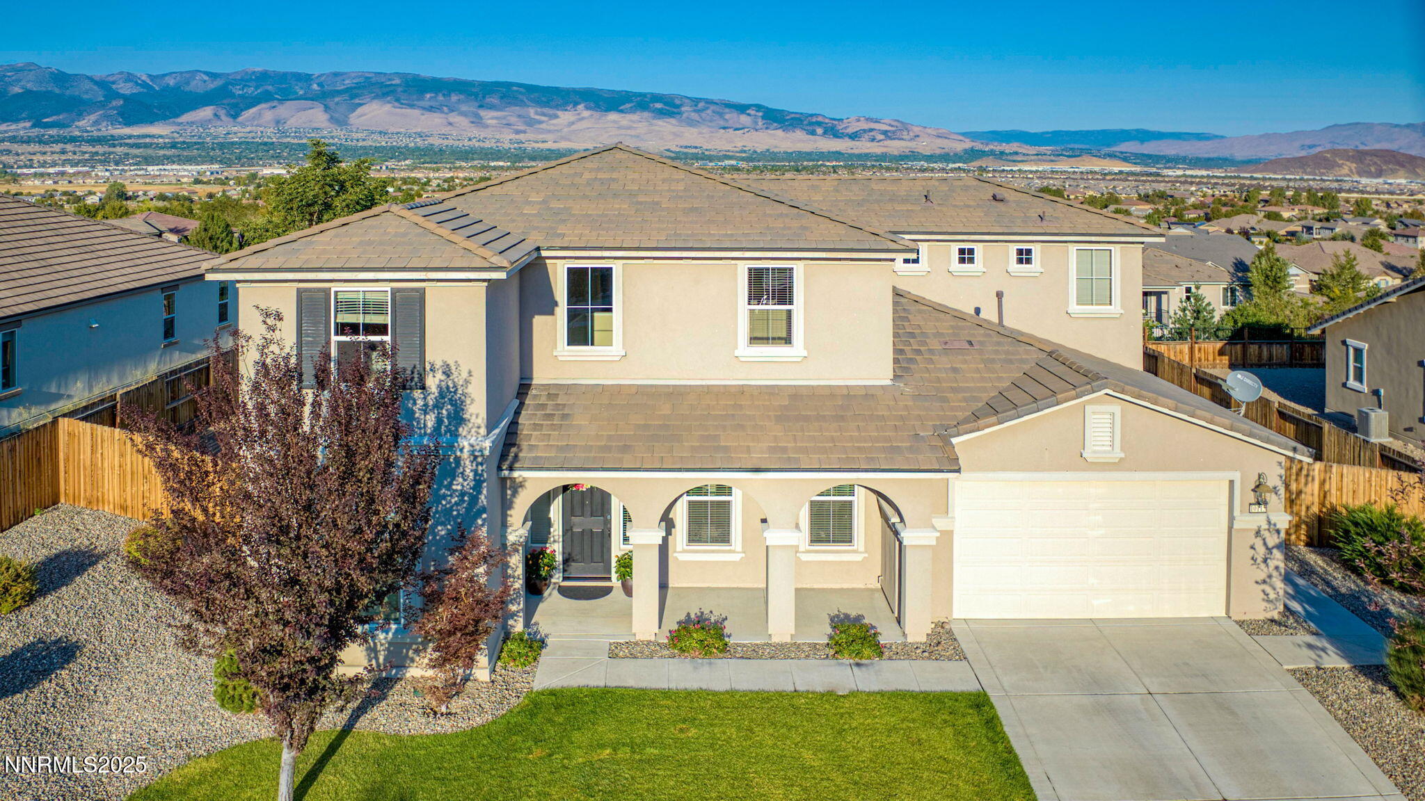 10115 Barrel Racer Drive Reno, NV 89521 - Photo 69 of 74 a front view of a house with garden