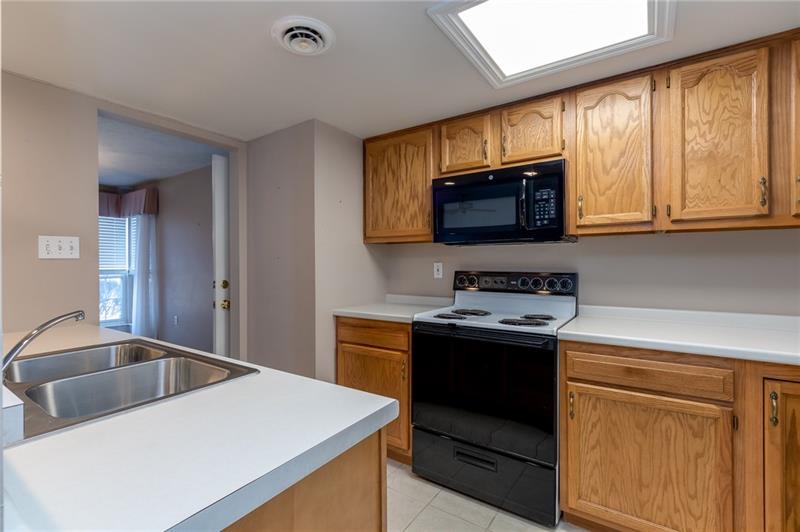 1269 Riverside Drive, Unit C Beaver, PA 15009 - Photo 6 of 20 Another view of the kitchen open to the dining area.