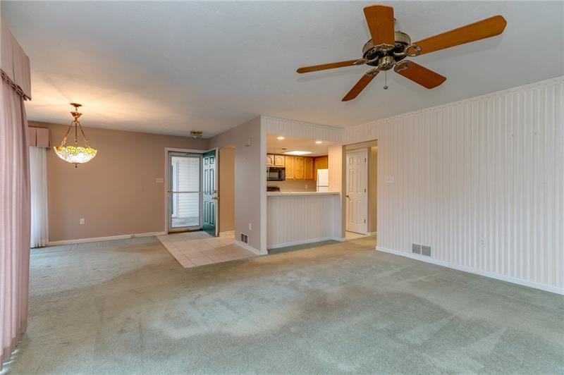 1269 Riverside Drive, Unit C Beaver, PA 15009 - Photo 9 of 20 View of living room, dining area and kitchen.