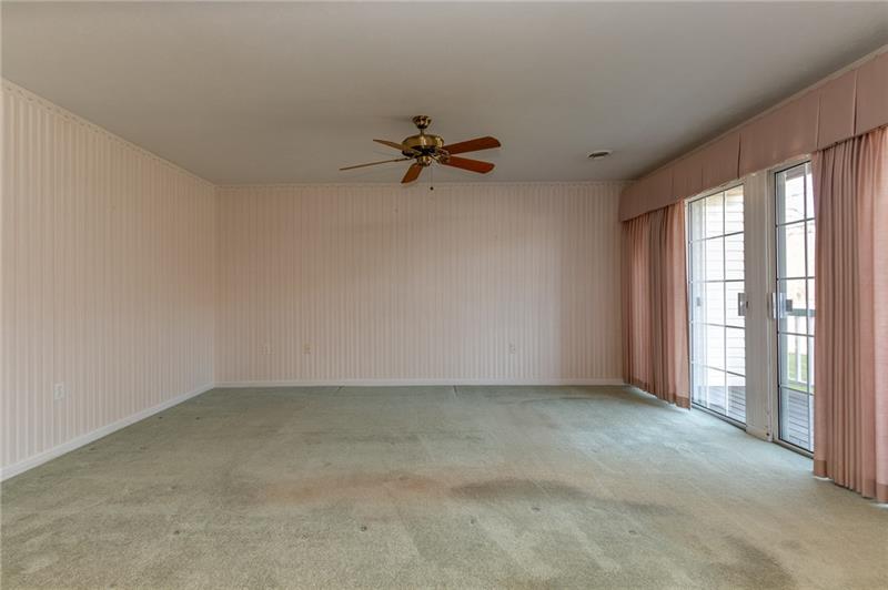 1269 Riverside Drive, Unit C Beaver, PA 15009 - Photo 10 of 20 Spacious living room with two sliding doors and a view that is awesome!