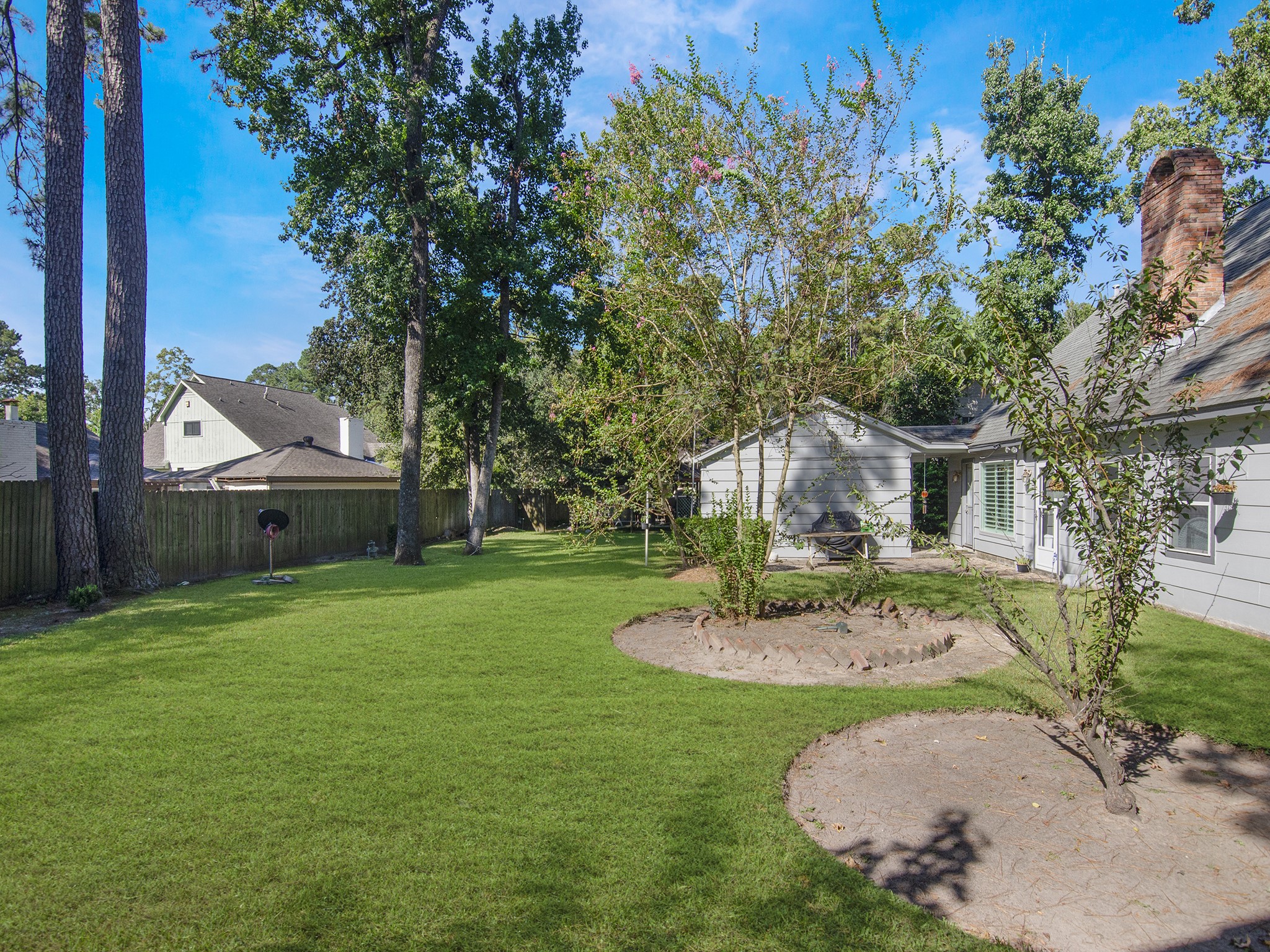 532 Raleigh Drive Conroe, TX 77302 - Photo 32 of 40 Plenty of room for play, gardening or a pool.