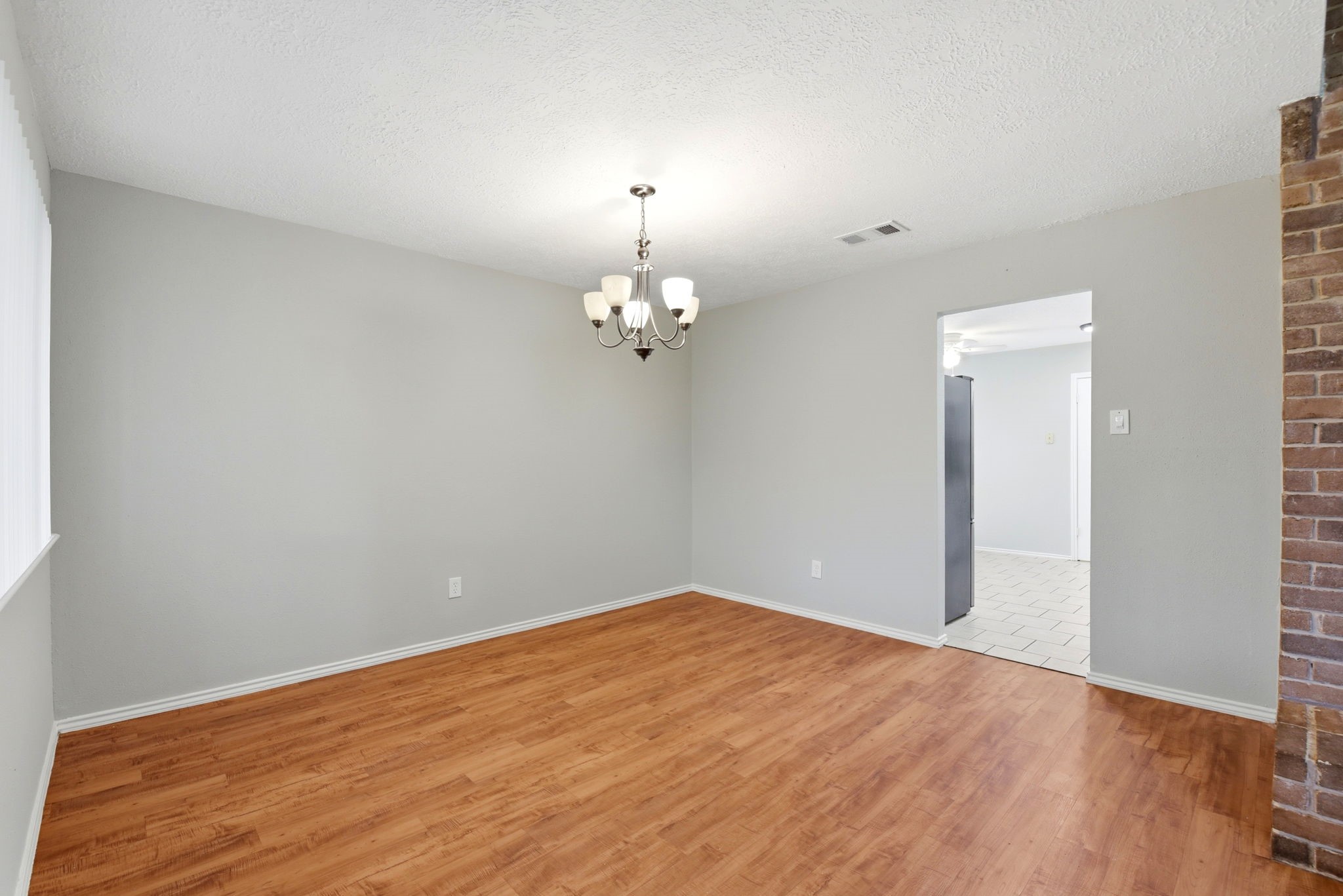 21330 Golden Dove Drive Spring, TX 77388 - Photo 9 of 29 A fantastic architectural flow bridges the dining room directly to the kitchen, making serving a breeze.