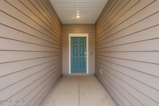 a view of kitchen with counter top space and appliances