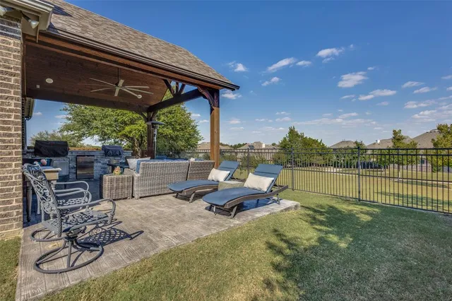 a view of swimming pool with outdoor seating