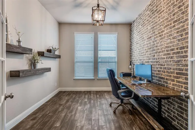 a workspace with furniture and window