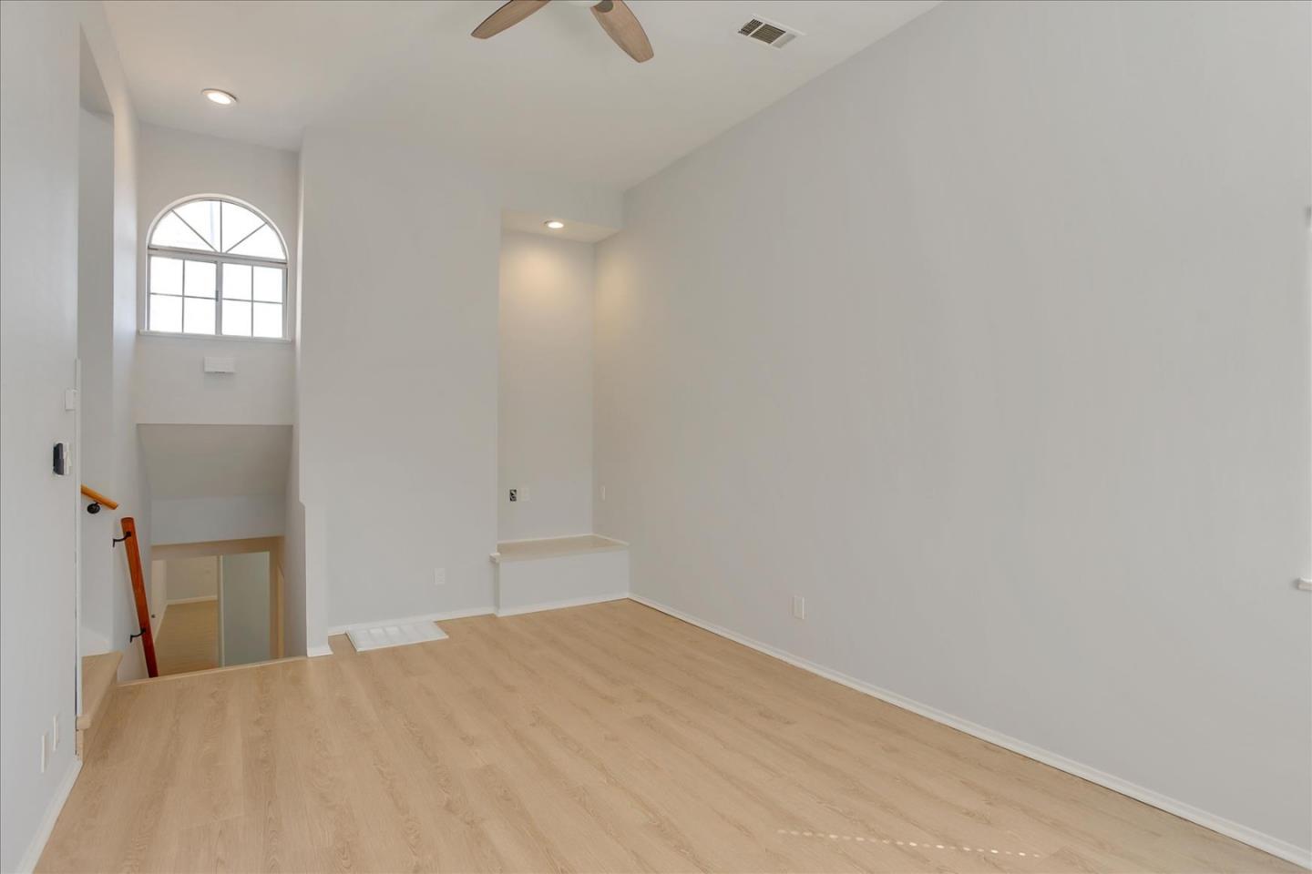 64 Darcy Avenue San Mateo, CA 94403 - Photo 20 of 54 a view of empty room with wooden floor and fan