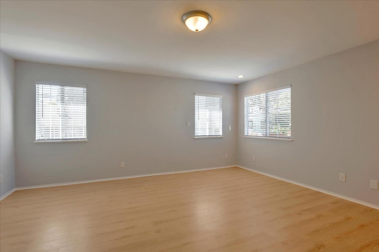 64 Darcy Avenue San Mateo, CA 94403 - Photo 23 of 54 an empty room with windows
