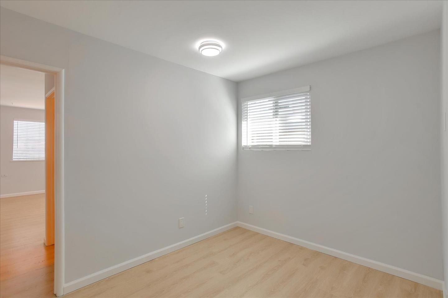 64 Darcy Avenue San Mateo, CA 94403 - Photo 29 of 54 an empty room with windows