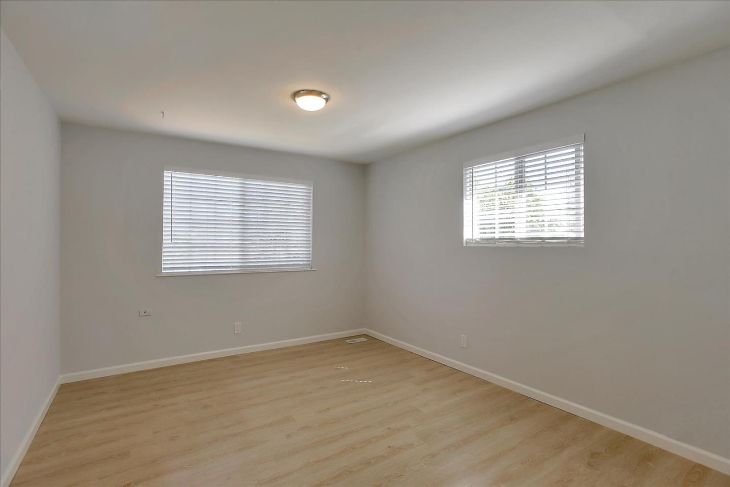 64 Darcy Avenue San Mateo, CA 94403 - Photo 30 of 54 an empty room with a window