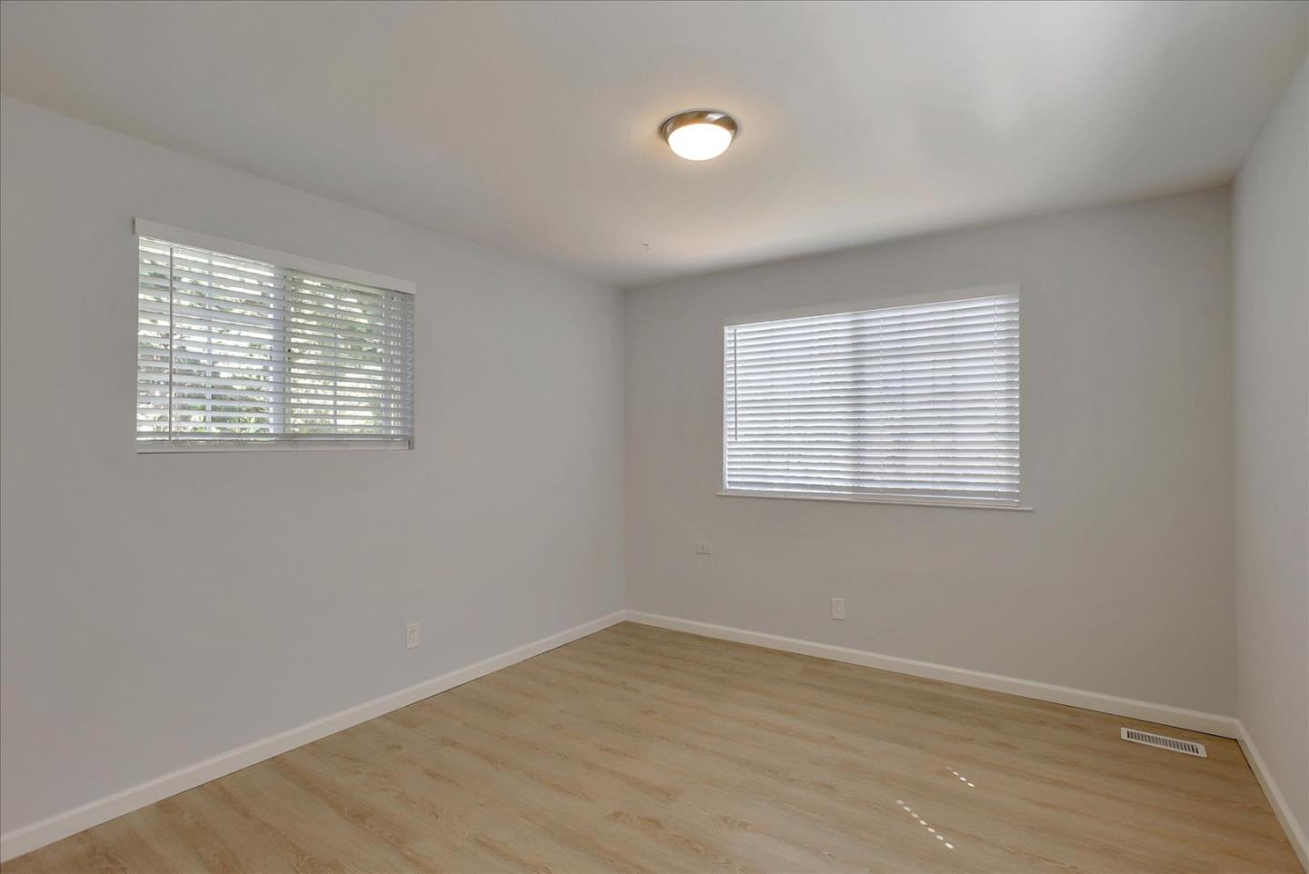 64 Darcy Avenue San Mateo, CA 94403 - Photo 31 of 54 an empty room with a window