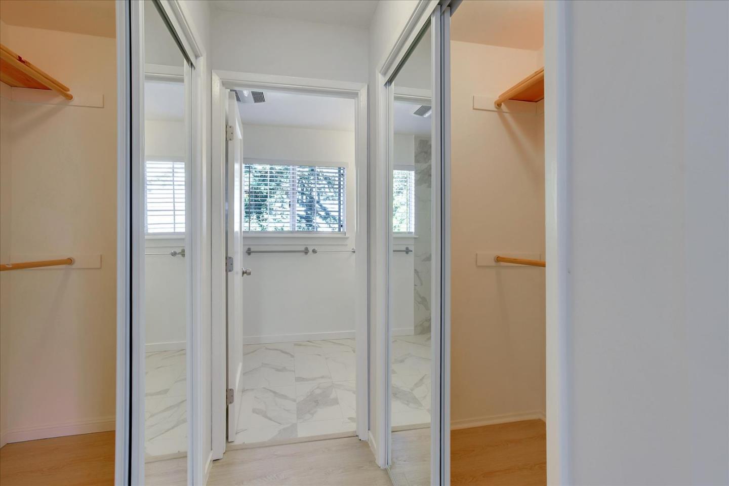 64 Darcy Avenue San Mateo, CA 94403 - Photo 41 of 54 a bathroom with a glass shower door