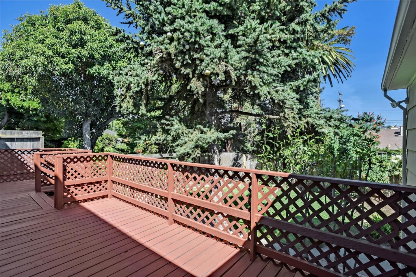 64 Darcy Avenue San Mateo, CA 94403 - Photo 48 of 54 a view of balcony with wooden floor and fence