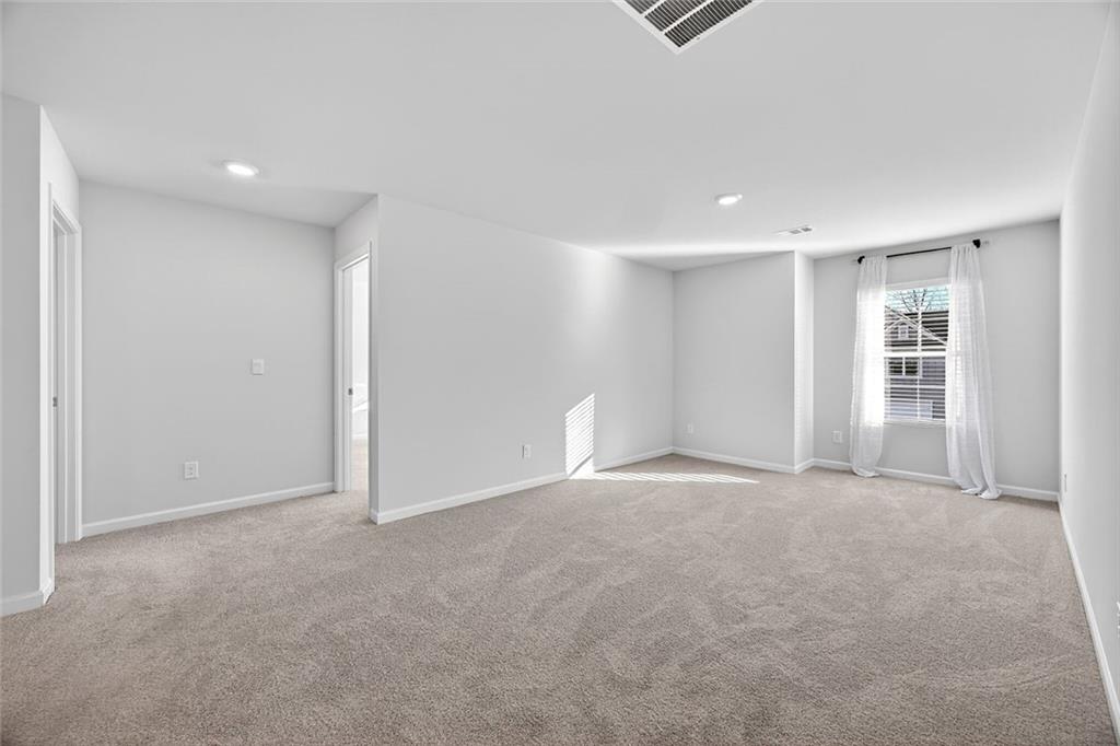 56 Berwick Crossing Dallas, GA 30157 - Photo 14 of 28 a view of an empty room with closet and bathroom