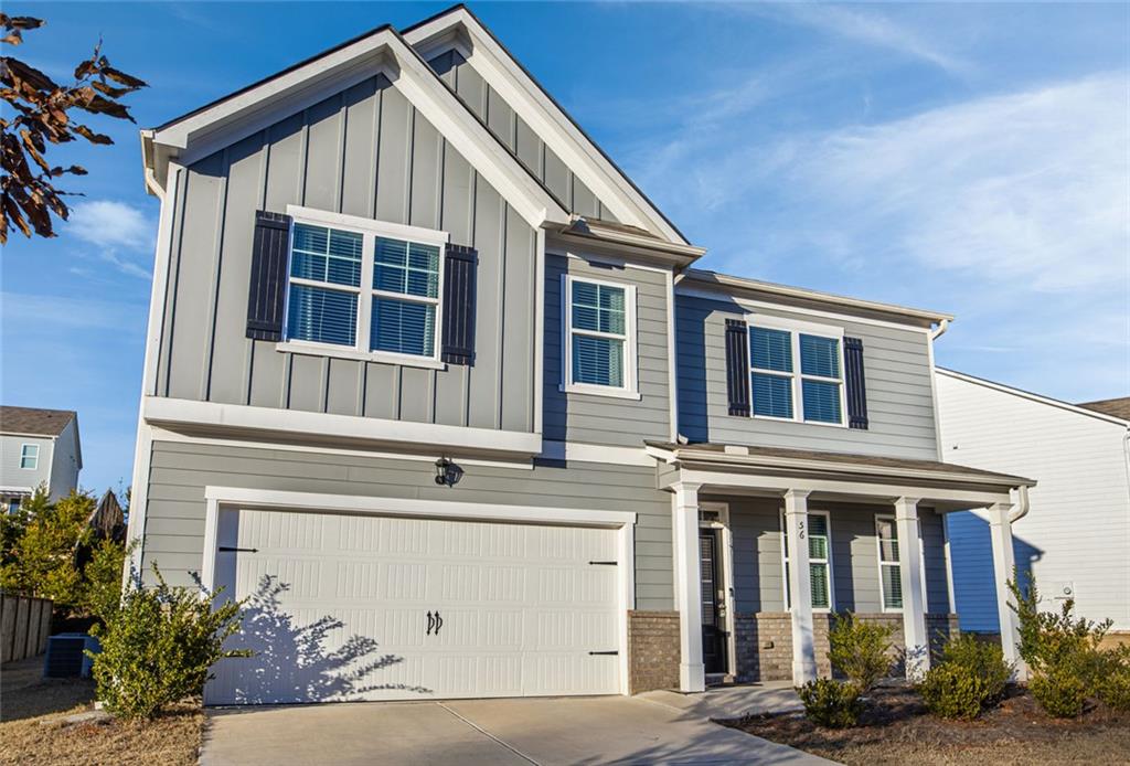 56 Berwick Crossing Dallas, GA 30157 - Photo 2 of 28 a front view of a house with a yard