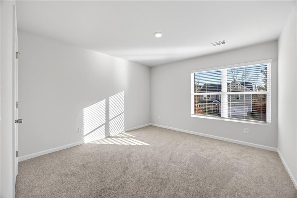 56 Berwick Crossing Dallas, GA 30157 - Photo 21 of 28 an empty room with windows