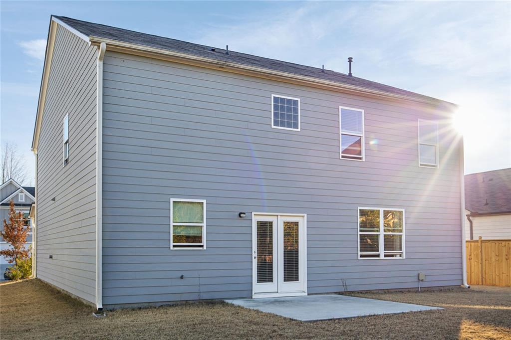 56 Berwick Crossing Dallas, GA 30157 - Photo 27 of 28 a view of a house with a window and a garage