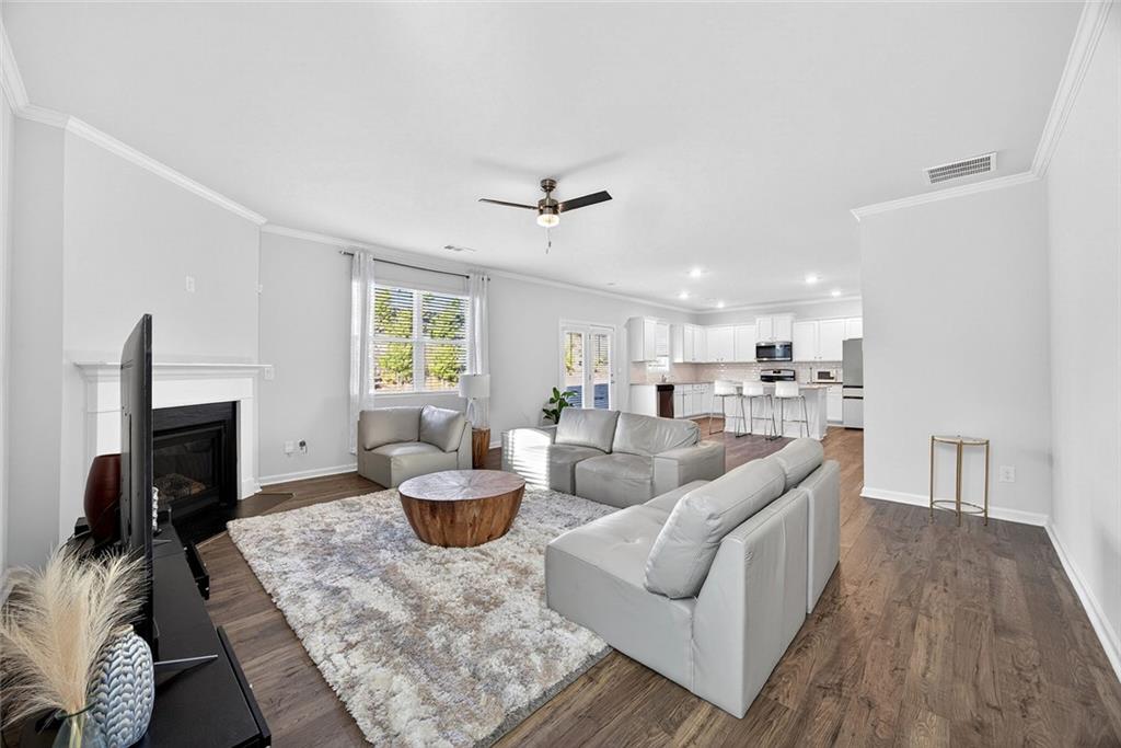 56 Berwick Crossing Dallas, GA 30157 - Photo 8 of 28 a living room with furniture a fireplace and a table