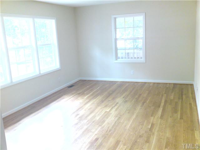 3608 Anclote Place Raleigh, NC 27607 - Photo 5 of 8 a view of an empty room and a window
