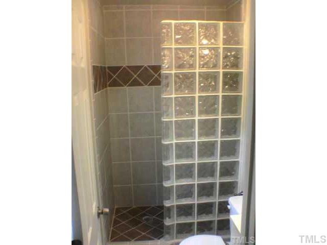 3608 Anclote Place Raleigh, NC 27607 - Photo 6 of 8 a view of a door with a door