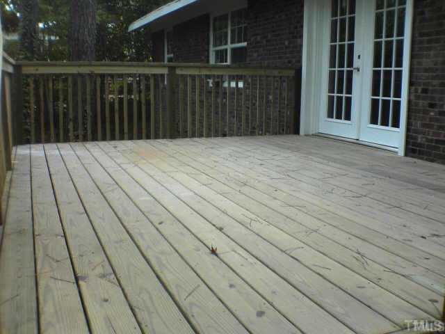 3608 Anclote Place Raleigh, NC 27607 - Photo 7 of 8 a view of wooden balcony