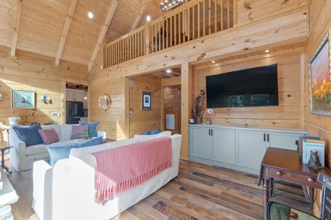 a view of a balcony with wooden floor