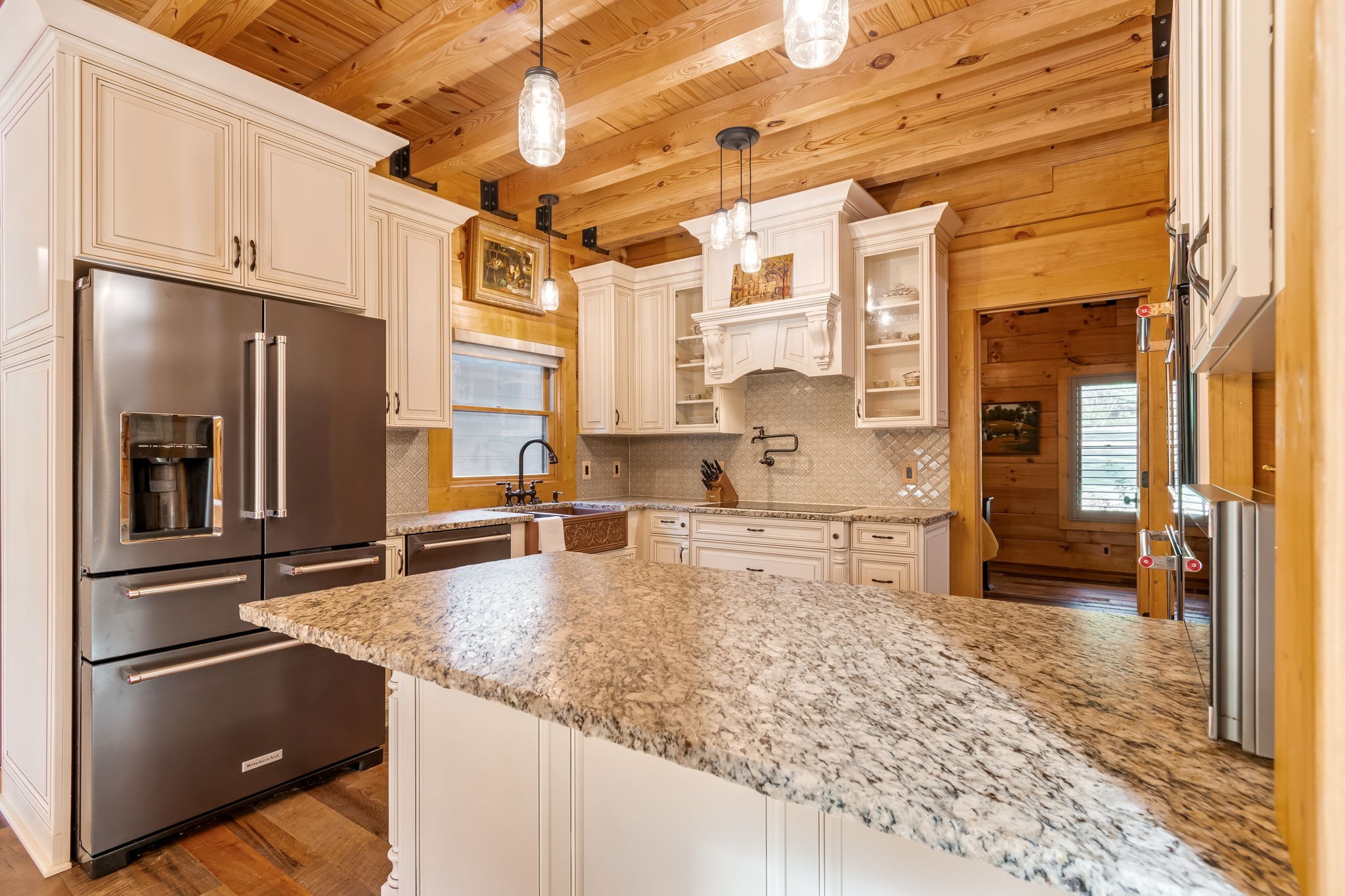 6011 Garrison Springs Road Franklin, TN 37064 - Photo 32 of 99 a kitchen with stainless steel appliances granite countertop a refrigerator and a stove