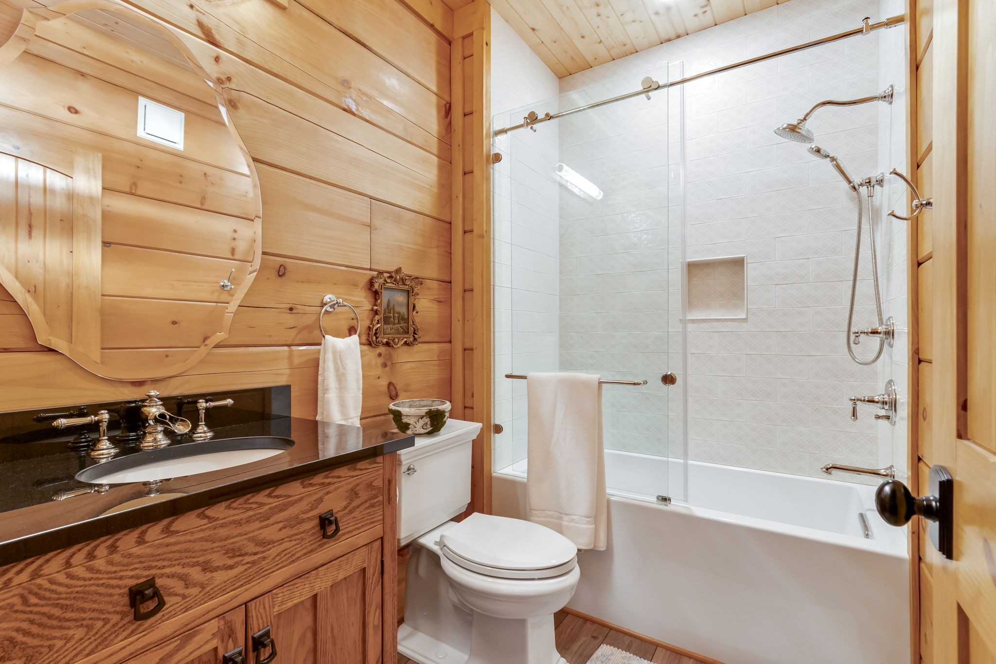 6011 Garrison Springs Road Franklin, TN 37064 - Photo 45 of 99 a bathroom with a sink a toilet and shower