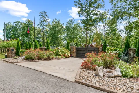 a view of a patio with a chairs and table in the patio