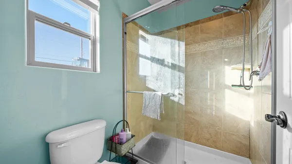 a bathroom with a sink and toilet