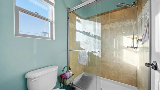 a bathroom with a sink and toilet