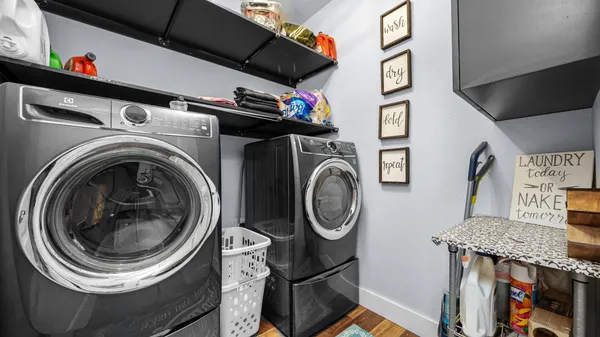 a utility room with dryer and washer