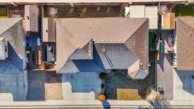 an aerial view of residential houses with wooden stairs