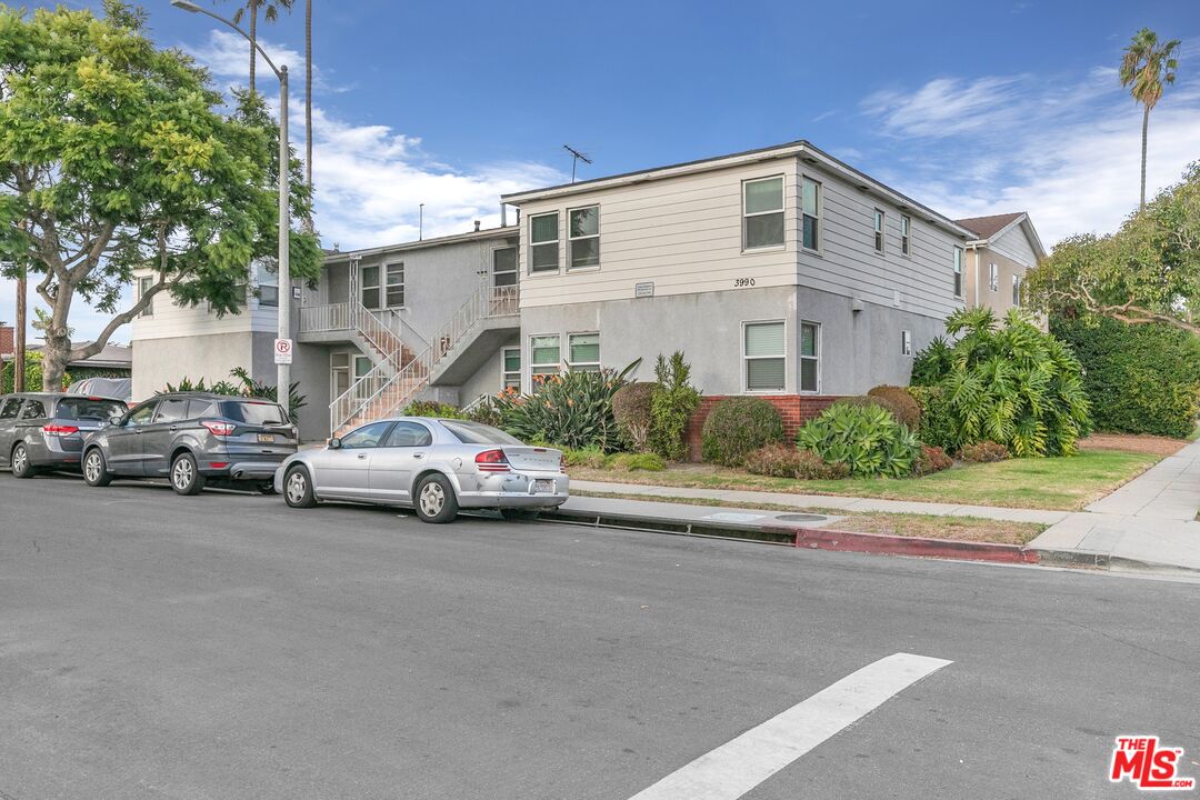3996 Berryman Avenue Los Angeles, CA 90066 - Photo 17 of 17 a car parked in front of white house