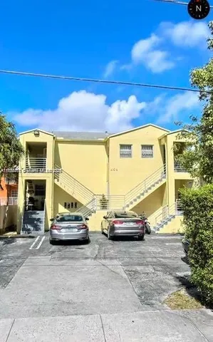 a view of car parked on the street