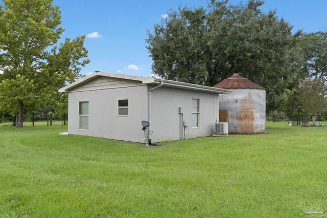 an aerial view of a house with a garden