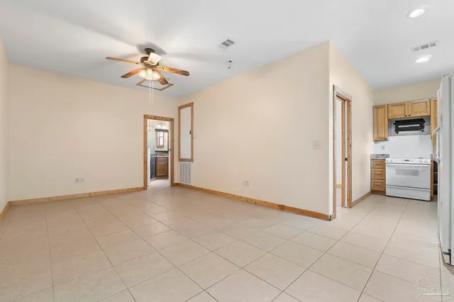 a view of a big yard with swimming pool and mountain view