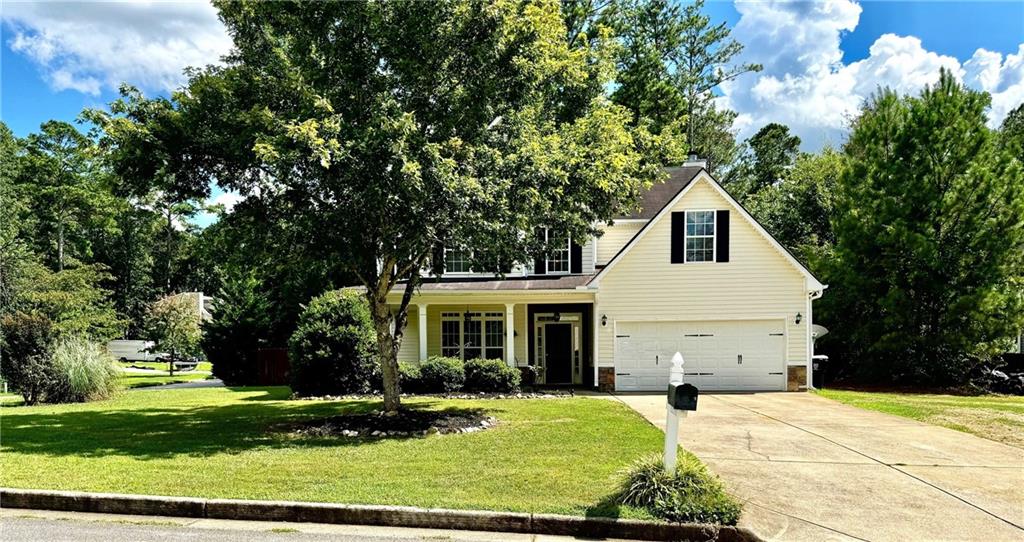 15 Jessica Lane Dallas, GA 30157 - Photo 1 of 1 a view of a white house with a yard