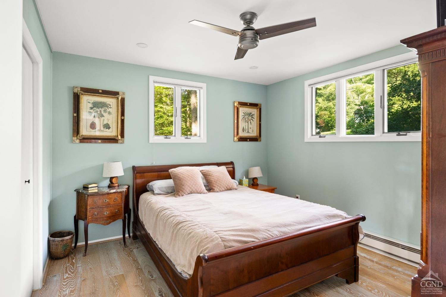 1264 Lakeview Road Copake, NY 12516 - Photo 17 of 24 a bedroom with a bed and wooden floor