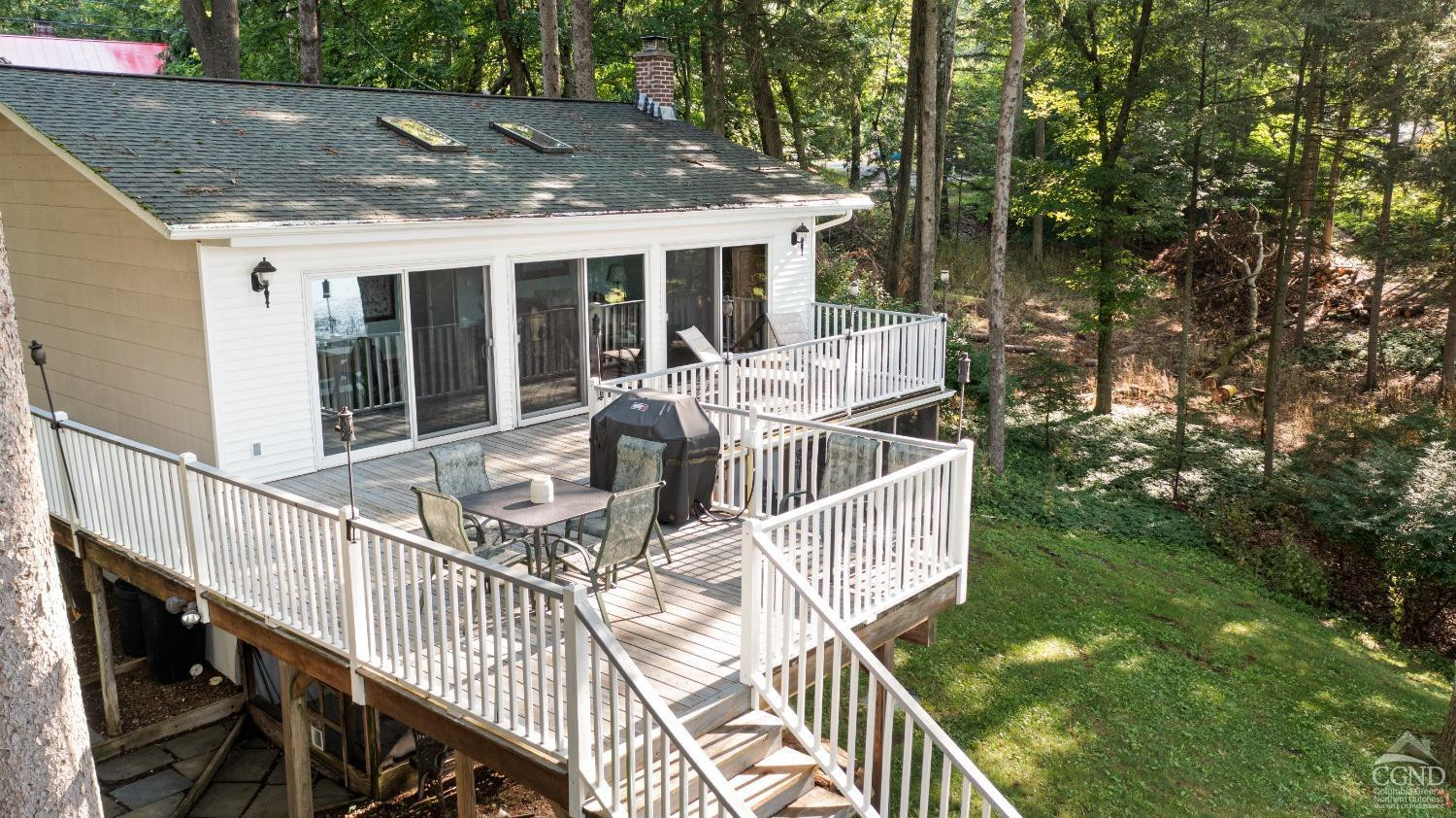 1264 Lakeview Road Copake, NY 12516 - Photo 21 of 24 a view of a house with backyard and porch