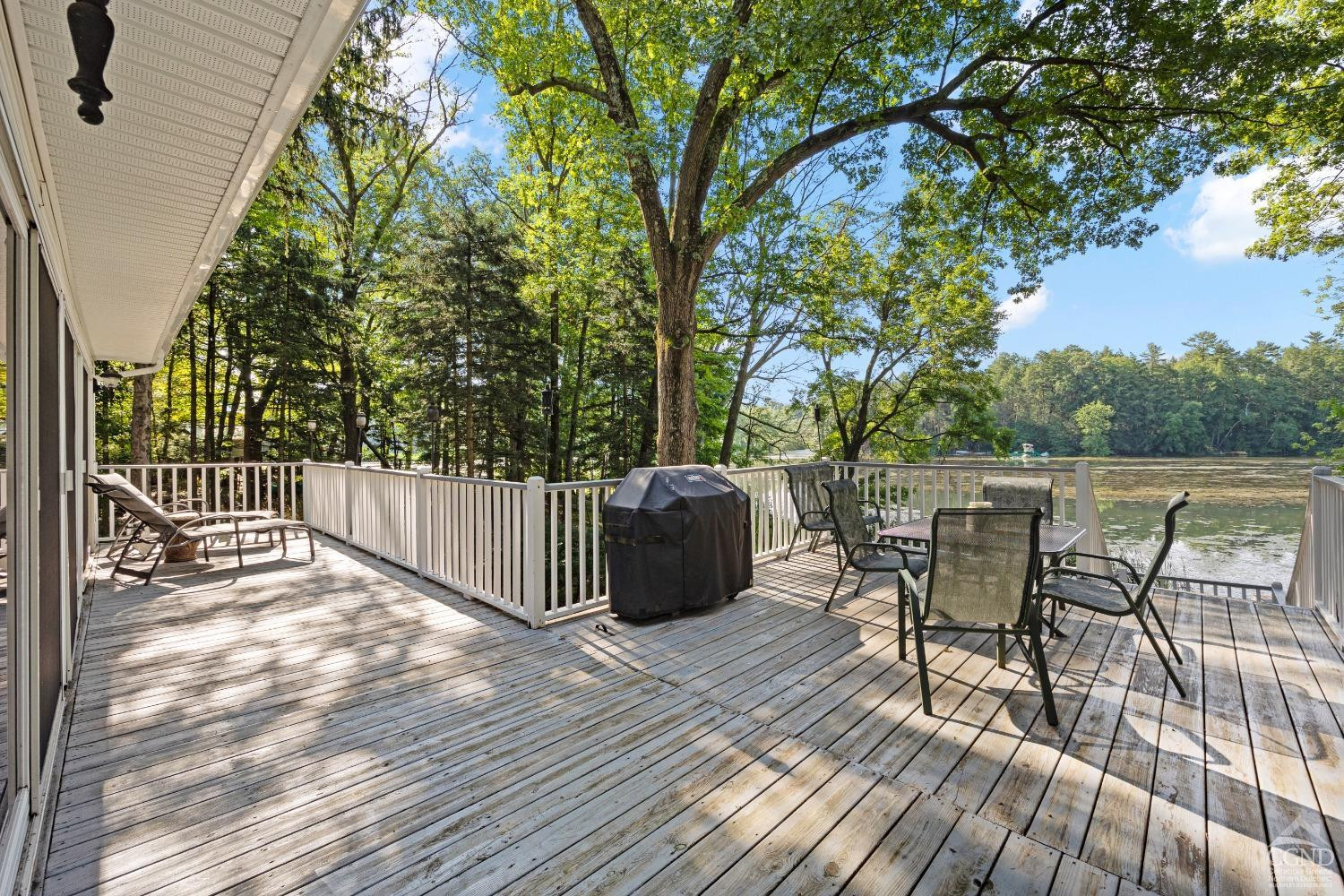 1264 Lakeview Road Copake, NY 12516 - Photo 22 of 24 a view of a chairs and table on the wooden floor