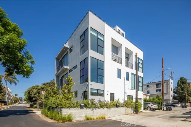 a view of a building with a street