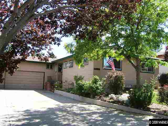 2090 Ives Avenue Reno, NV 89503 - Photo 1 of 9 a front view of a house with a yard